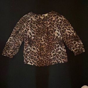 Leopard blouse with open circle back. Urban outfitters. Size xs